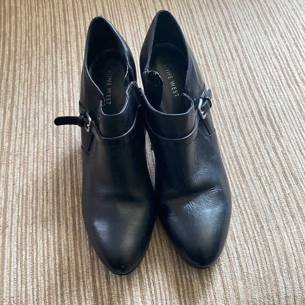 Cute lady bootie high heels shoes.